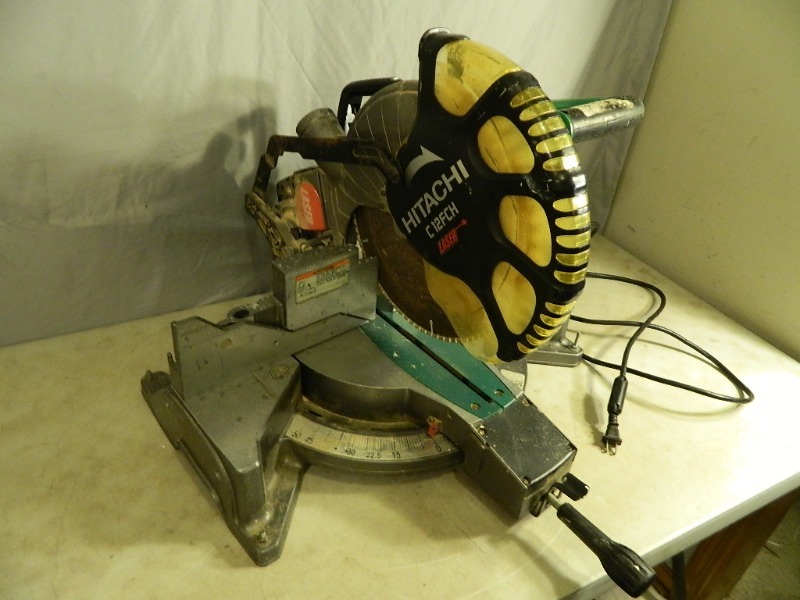 lot 56 image: 12 Hitachi Miter Saw