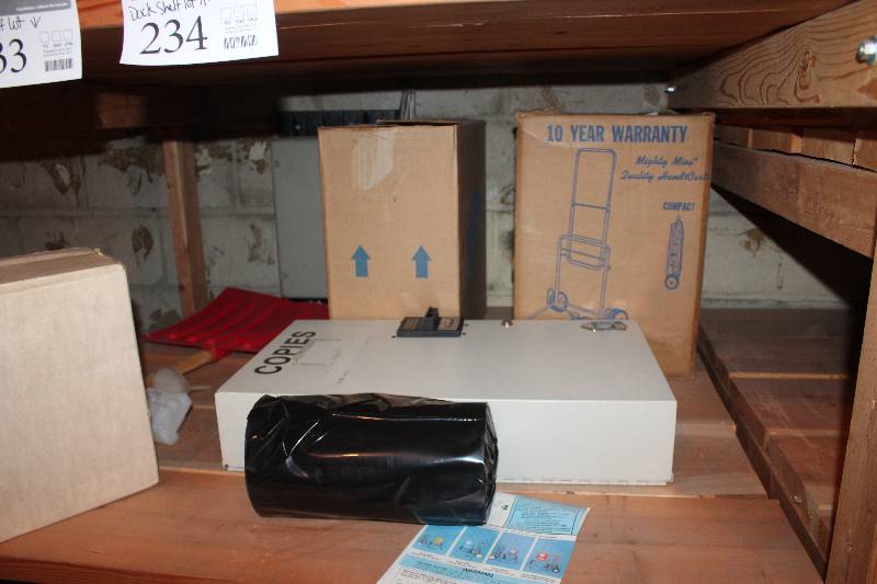 lot 233 image: Shelf Lot of 2-Wheel Luggage Carts, Coin Machine, And More