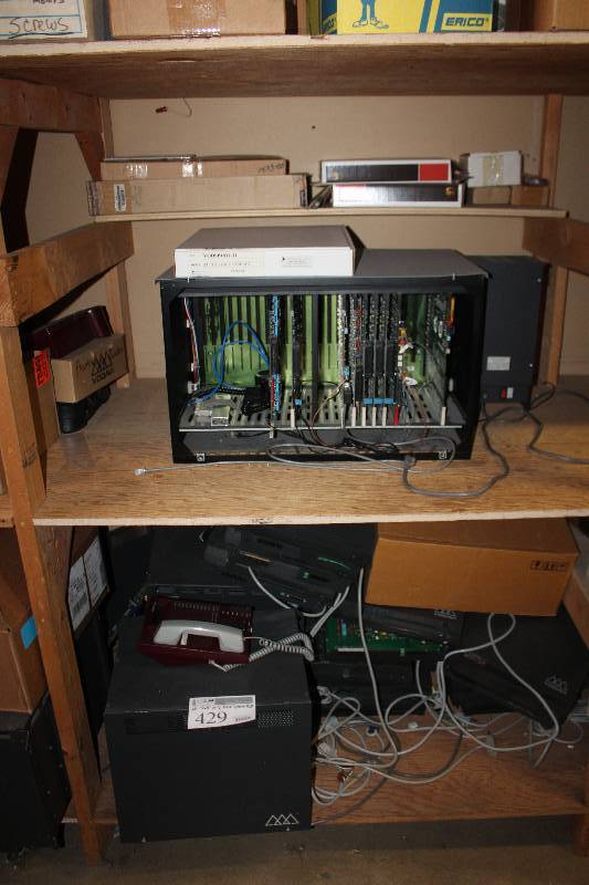 lot 429 image: Shelf Lot of Phone System Parts