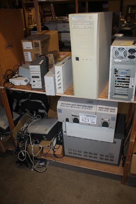lot 423 image: Shelf Lot of Phone System Parts