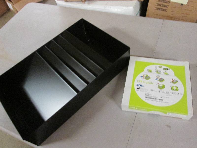 Box of CPR-D Pads, Black Metal Stat...