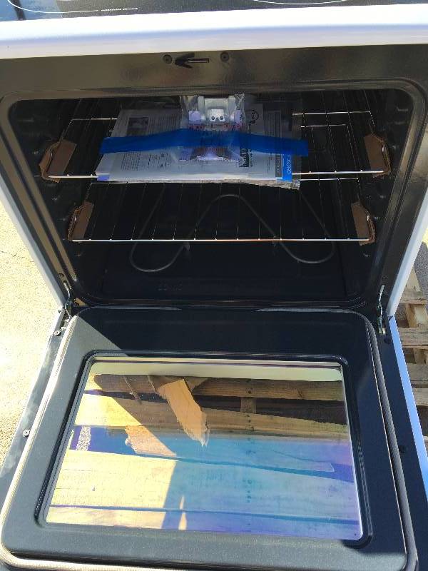 New Frigidaire 30 Freestanding Electric Range retail $699 missing front glass everything else is there
