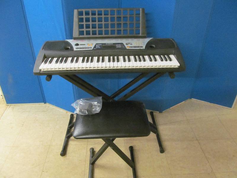 lot 1 image: Yamaha music keyboard