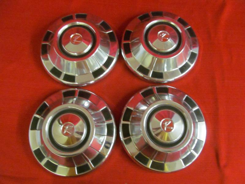 lot 27 image: vintage hub caps