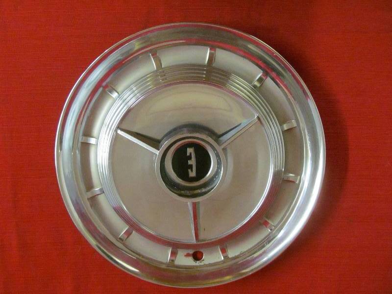 lot 31 image: vintage hub caps