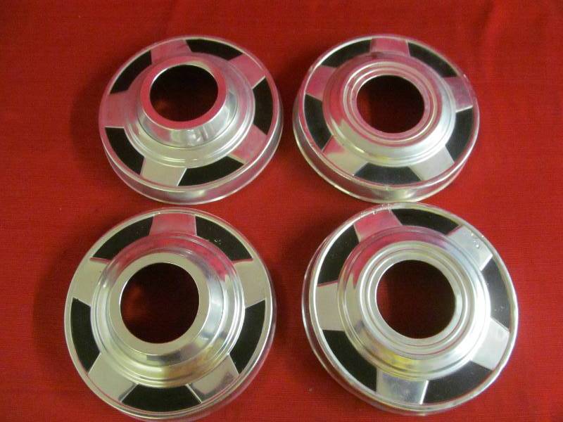 lot 41 image: vintage hub caps