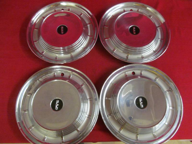 lot 42 image: vintage hub caps