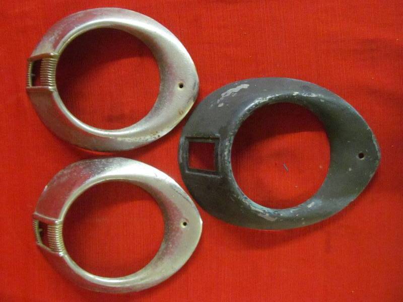 lot 44 image: vintage headlight bezels