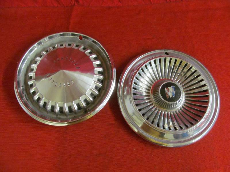 lot 54 image: vintage hubcaps