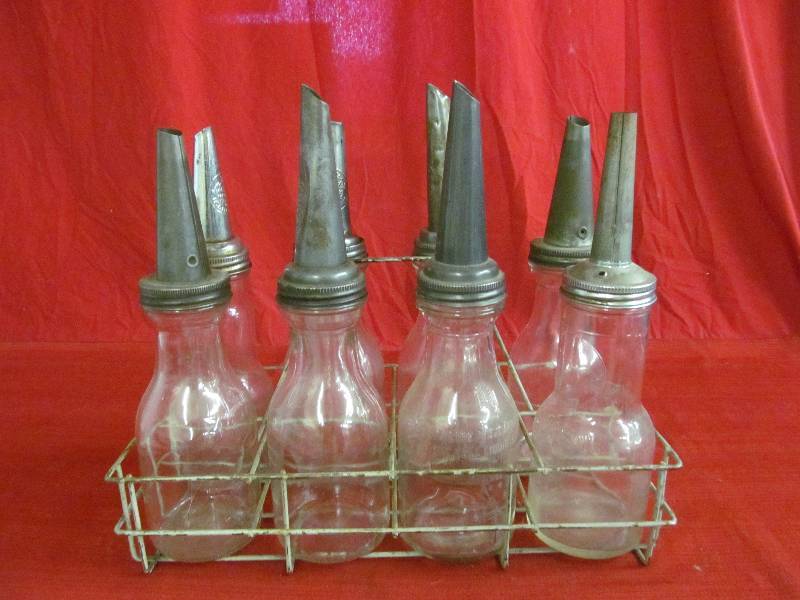 lot 57 image: vintage oil bottles