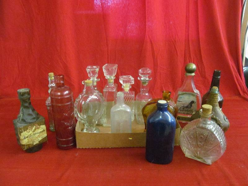 lot 111 image: vintage bottles , decanters