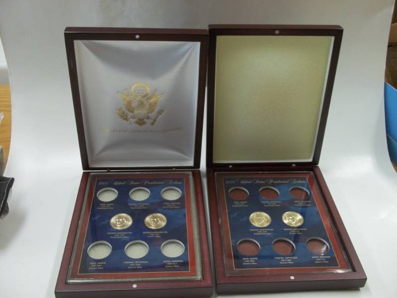 Pair of Presidential Dollar Cases with 4 Dollars