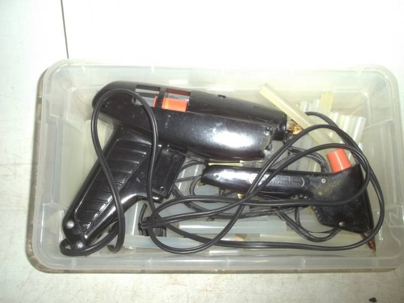 Pair of hot glue guns with glue