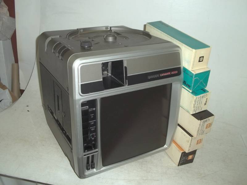 Singer Caramate 4000 Slide projector with Cassette player, remote and microphone, with Argus slide trays