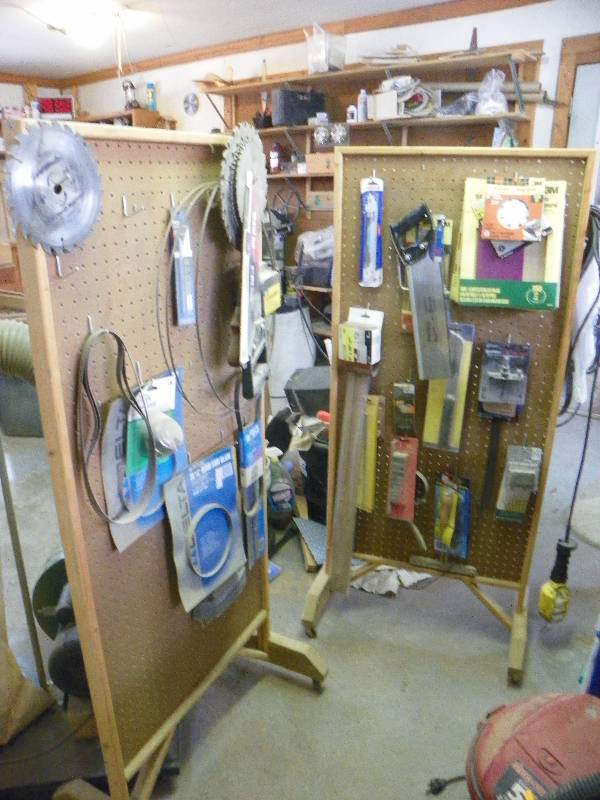 lot 17 image: 2 peg board walls with contents