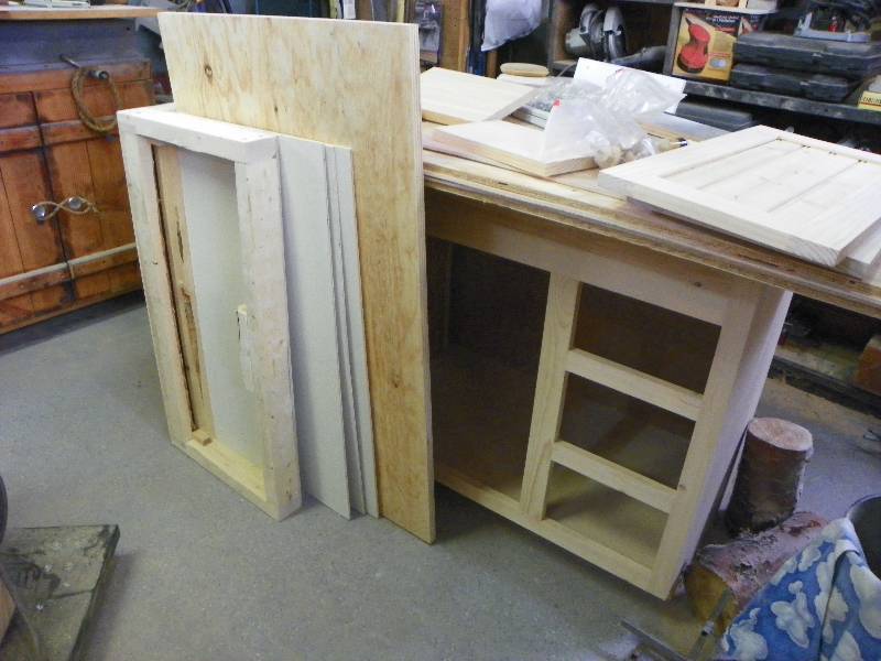 lot 18 image: Partially constructed cabinet and extra wood