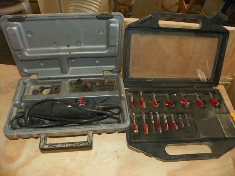 lot 37 image: Dremel tool in case and router bit set