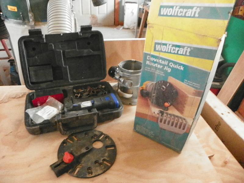 lot 38 image: Dremel tool in case and Dovetail Quick Router Jig