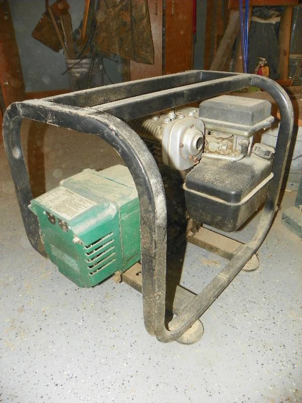 lot 61 image: Coleman powermate generator