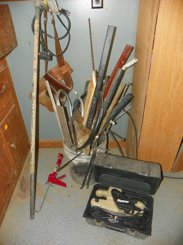 lot 83 image: Bucket of pipes and misc, pipe bender, and Rockwell Tool