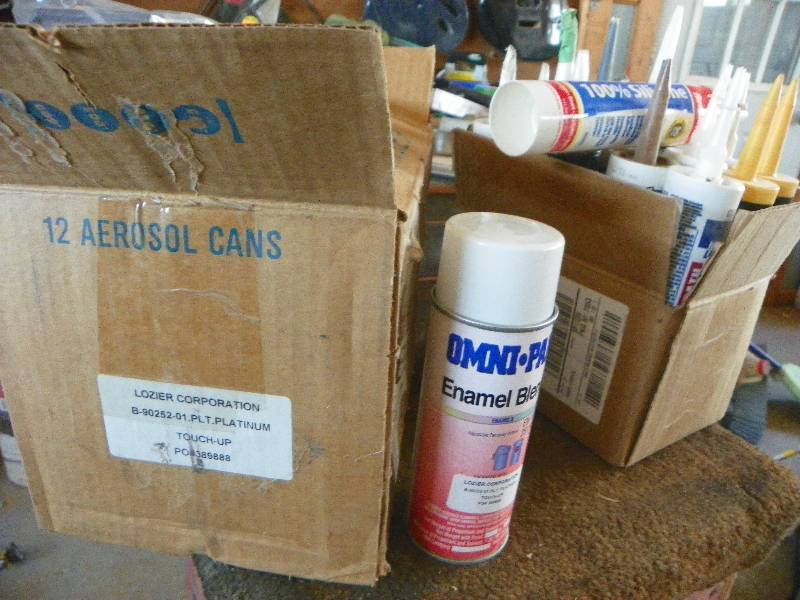 lot 101 image: Spray paints and caulking tubes