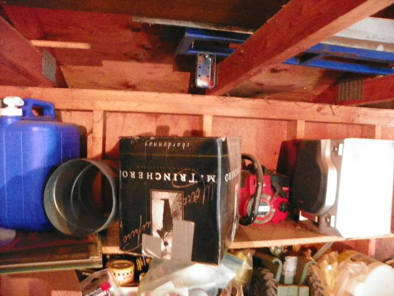 lot 163 image: Contents of shelf, chain saw, box of nails, speaker