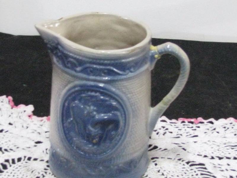 lot 52 image: Red Wing Stoneware Cows Pitcher