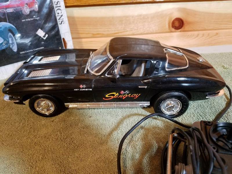lot 87 image: Remote Corvette With Classic Tin Sign