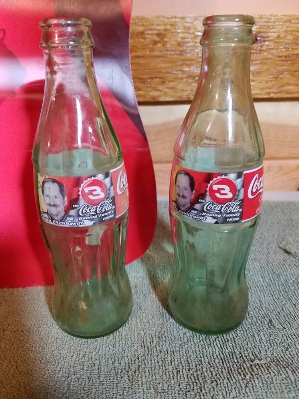 lot 118 image: Coca-Cola Bottle Banner & Bottles