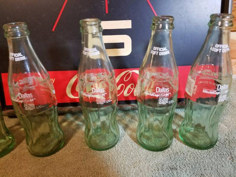lot 119 image: Coca-Cola Clock & Bottles