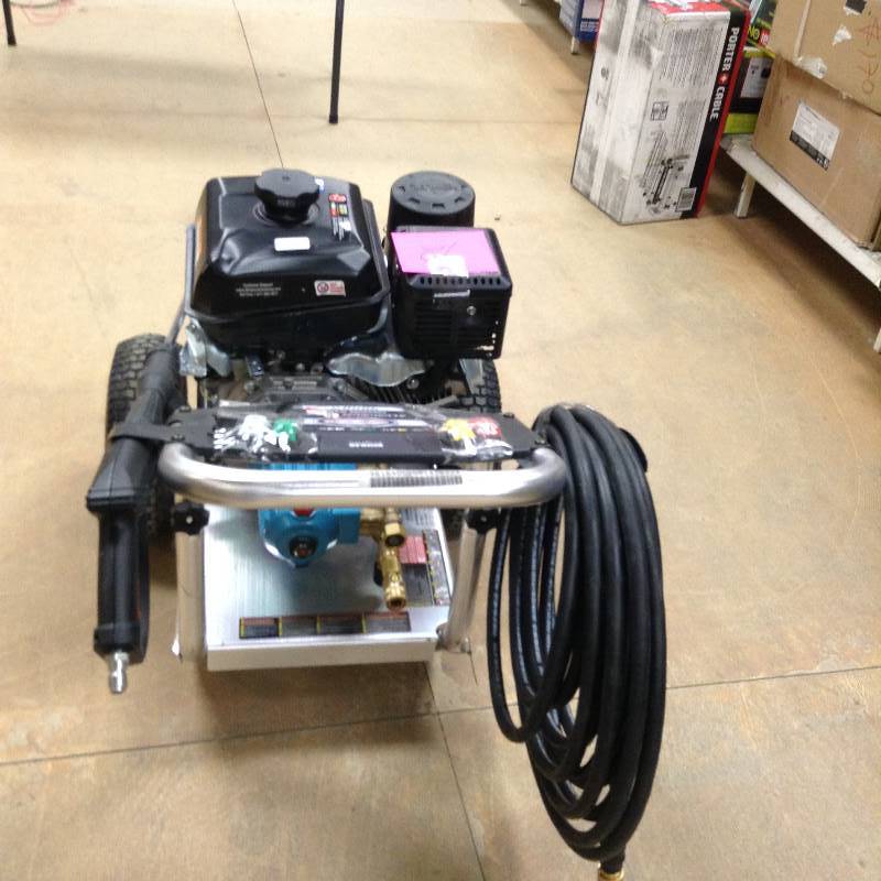 lot 92 image: Simpson Aluminum Series 4,000 psi 3.3 GPM Gas Pressure Washer KOHLER CH395 OHV commercial series engine in like new condition however a cover is craked see pictures
