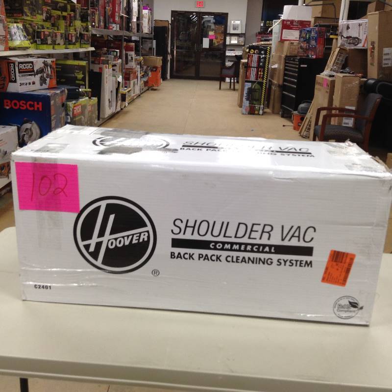 lot 102 image: Hoover Shoulder Vac Commercial Backpack cleaning syste new however missing 3 attachments