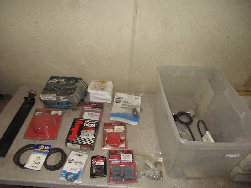lot 31 image: misc tote of new parts see pictures