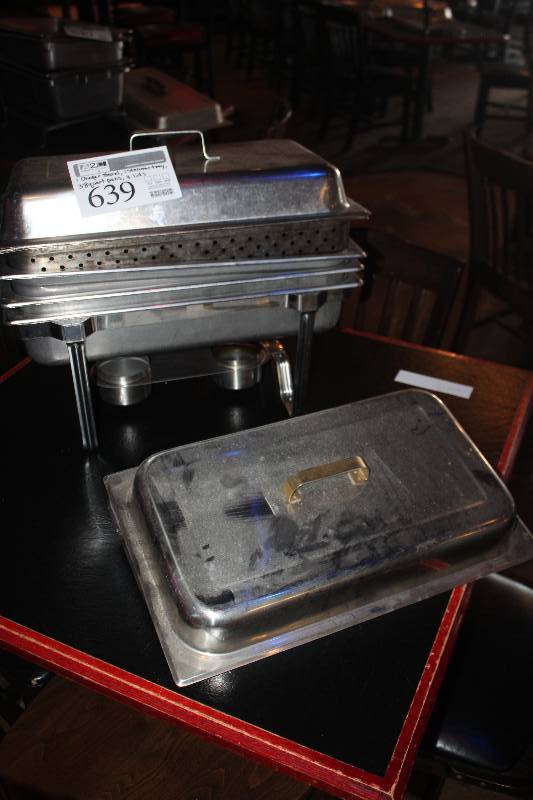 lot 639 image: Lot of (8) Commercial Stainless Steel Kitchenware Includes 1) Chafer Stand, 2) Lids, 1) 8-Quart Pan, 4) 4-Quart Pans