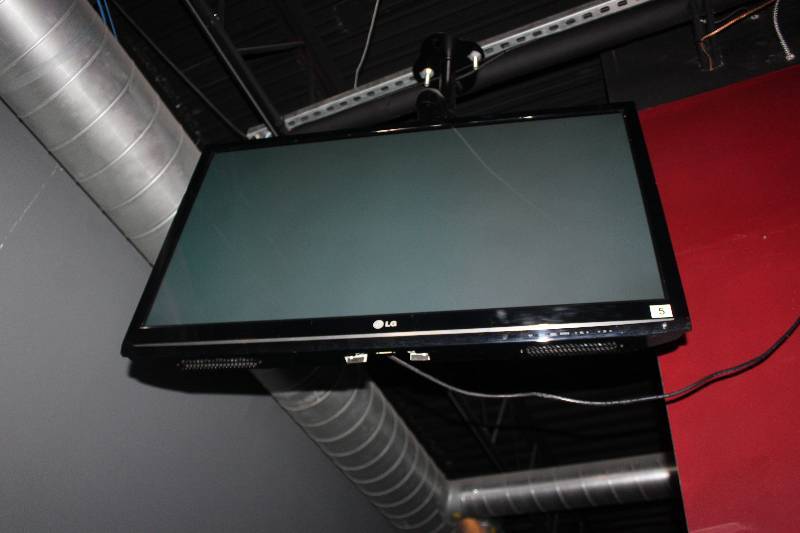 lot 32 image: LG Wall Mount 42in. TV
