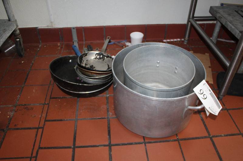 lot 99 image: Lot of (9) Kitchenware Includes 2) Pots, 7) Pans