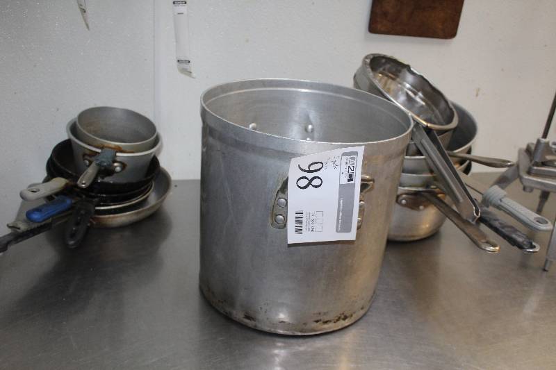 lot 98 image: Lot of (12) Kitchenware Includes 5) Pots, 7) Pans
