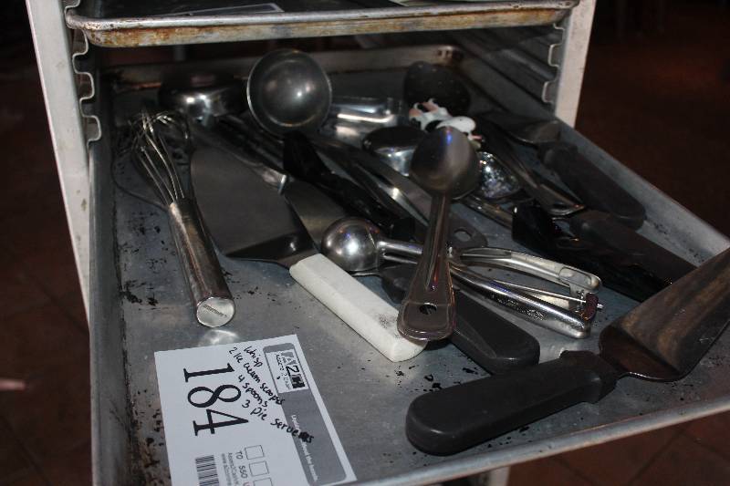 lot 184 image: Lot of (10) Kitchenwares Includes 1) Whisp, 2) Ice Cream Scoops, 4) Spoons, 3) Pie Servers
