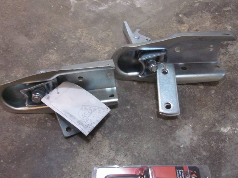 lot 34 image: Hitch Couplers & Stake Pocket Anchors