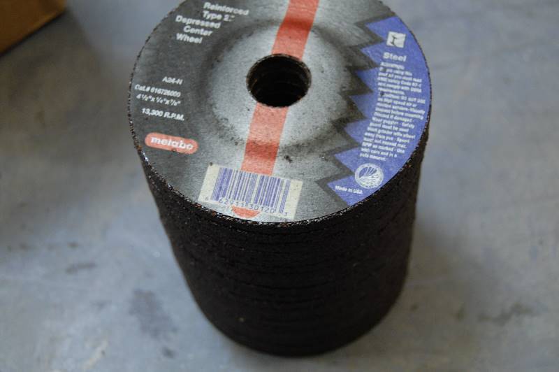 lot 17 image: 4-12 x 14 x 78 A24N Type 27 Depressed Center Grinding Wheel