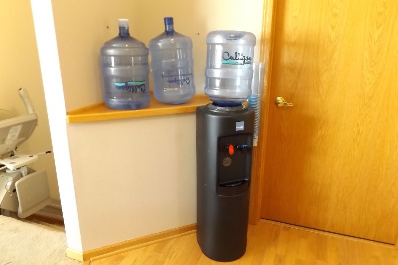 lot 14 image: Working Clover Brand Hot and Cold Water Dispenser With Refills