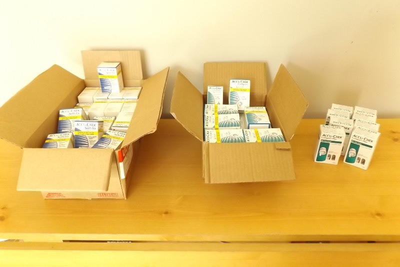 lot 46 image: Large Lot of New in Box Accu-Chek Lancets and Test Strips