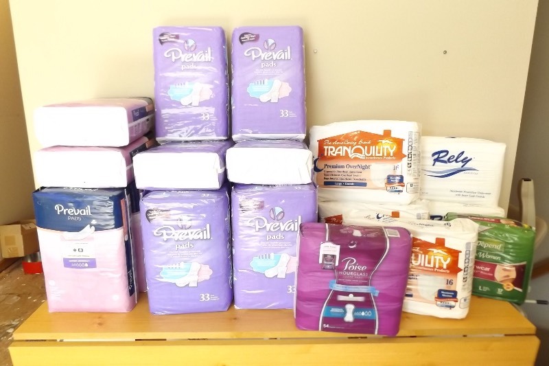 lot 47 image: Large Lot of New Adult Diapers and Pads