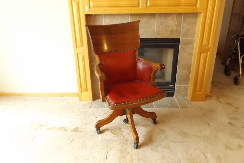 lot 74 image: Antique Wood and Iron Bankers Chair