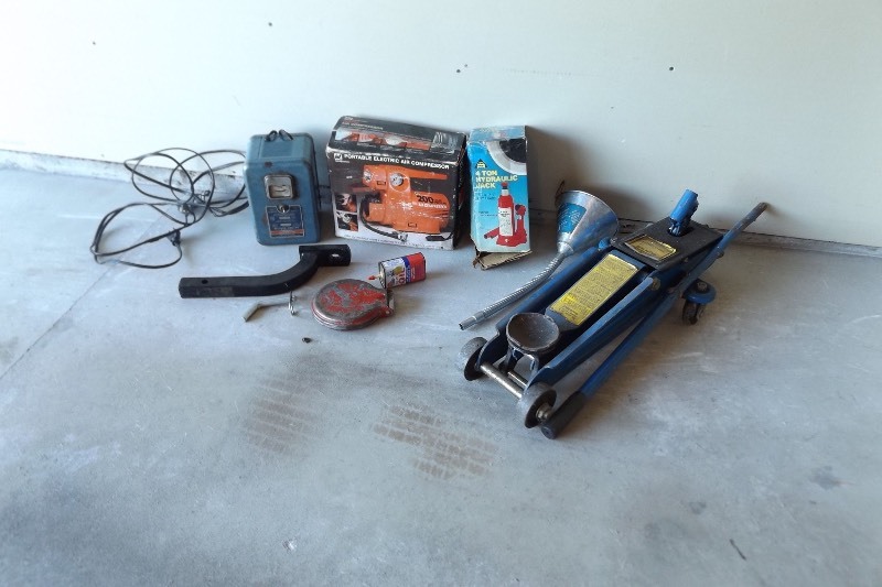 lot 85 image: Lot of Miscellaneous Automotive Jacks, Funnels, Charger, etc.