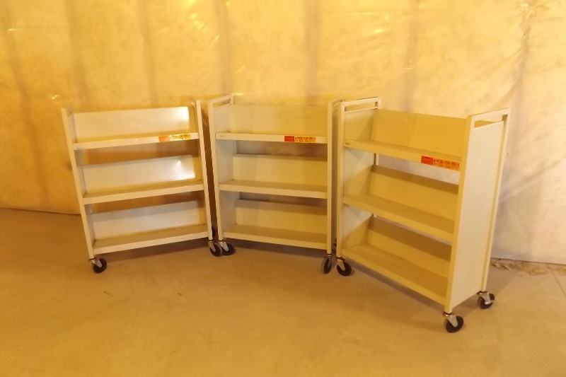 lot 101 image: 3 Metal Rolling Book Shelves