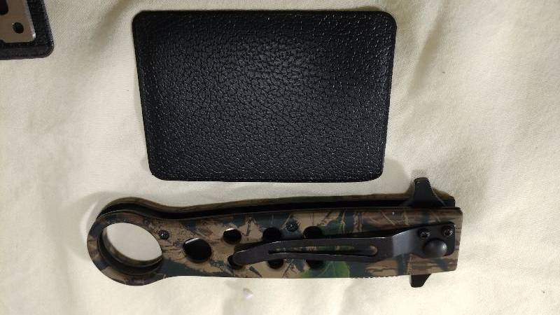 Spring-Assisted Folding Knife with a Wallet Multi-Tool