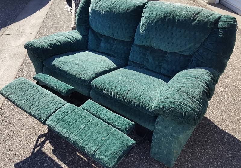 Green Reclining love seat