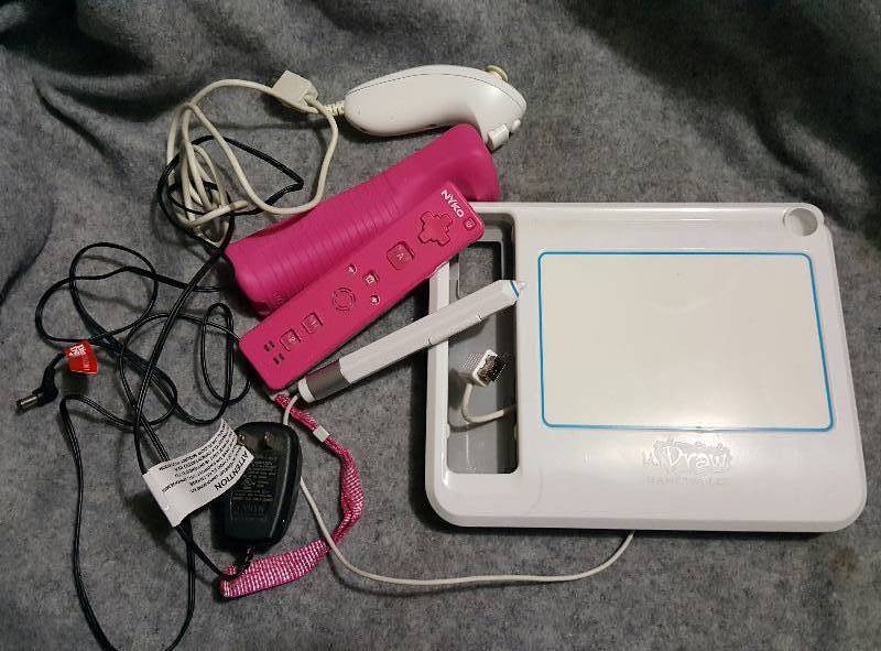 Pink Wii controller, with Wii drawing pad, and numchuck