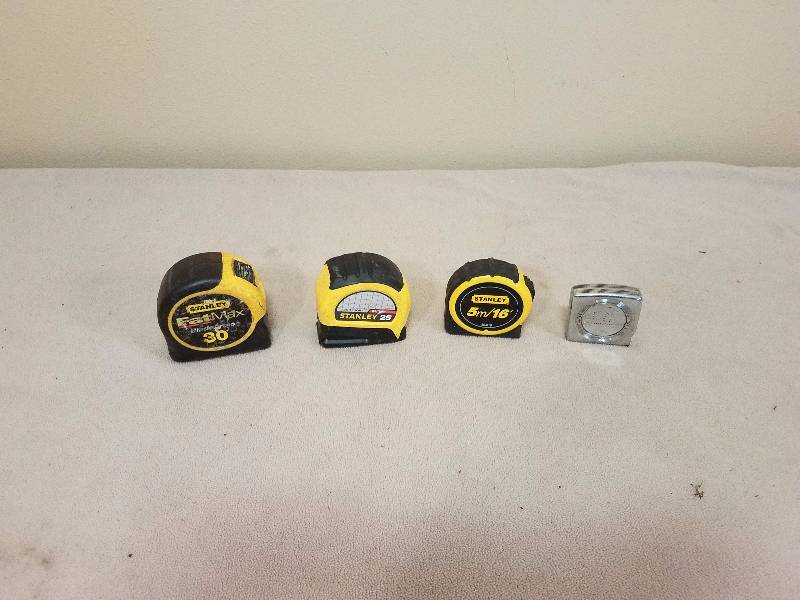 lot 27 image: Mixed Tape Measure Lot #1
